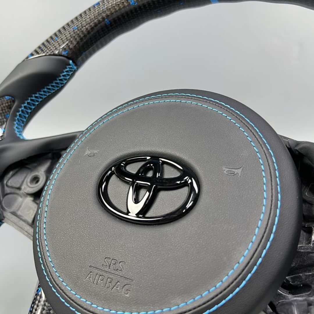Toyota GR Supra Custom Carbon Fiber Steering Wheel With Genuine Leather